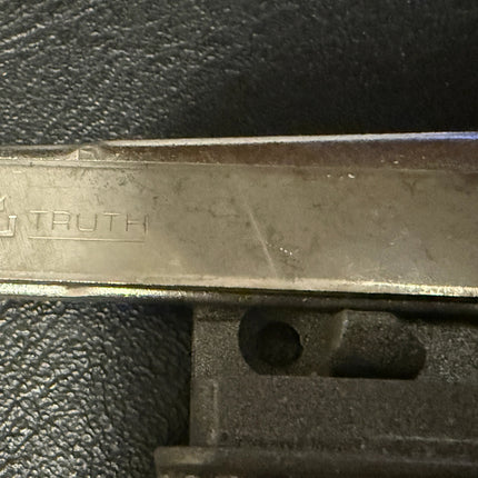 222 - Amesbury Truth Awning Encore Narrow Sill Mounted Operator. Close up of operator arm showing truth logo stamp 