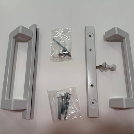 A modern rectangular door handle in a bright white finish, shown with their mounting hardware including screws on a plain white surface.