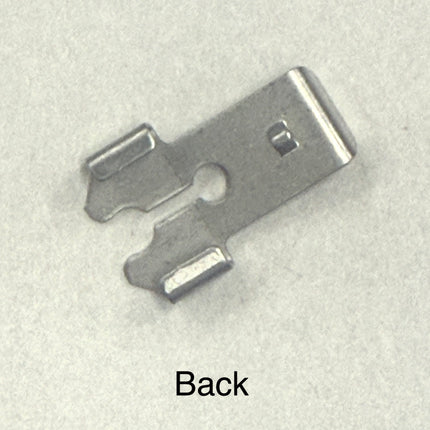 Metallic object on a textured gray background with 'Back' text.