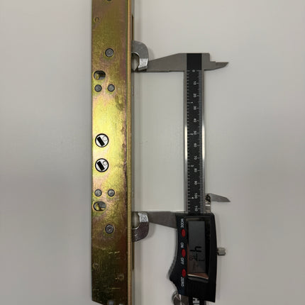 Part Number C1035 Amesbury Truth Gemini II  PD Dual Action Mortise Lock with Flat face plate. Standard medial finish shown in a white background. Dual lock hooks in locked position. With calipers showing hook to hook measurement of 4 7/16 inches. 