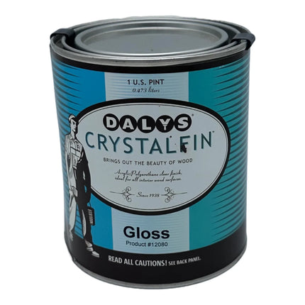 A can of CrystalFin water-based polyurethane with a gloss finish, indicating it is non-toxic and brings out the beauty of wood. The can has a blue and black color scheme with text and branding. Gloss Finish. One Pint can